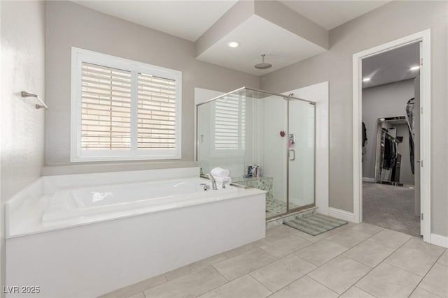 8 Via Tiberina, Las Vegas, NV 89011 - full bath with a shower stall, a bath, tile patterned flooring, a spacious closet, and baseboards