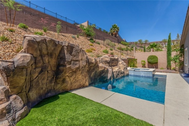 8 Via Tiberina, Las Vegas, NV 89011 - view of swimming pool featuring a fenced backyard and a pool with connected hot tub