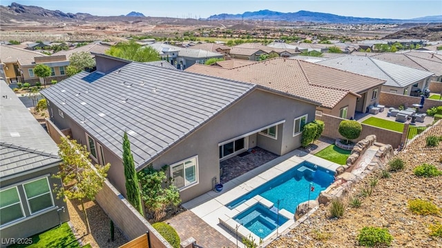 8 Via Tiberina, Las Vegas, NV 89011 - aerial perspective of suburban area featuring mountains and a pool
