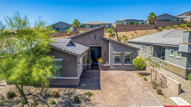 8 Via Tiberina, Las Vegas, NV 89011 - view of front of home with stucco siding, a tiled roof, and a residential view