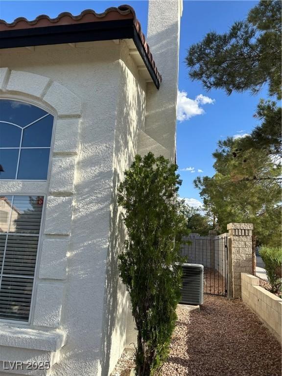1511 Balsam Mist Ave, Las Vegas, NV 89183 - view of property exterior featuring stucco siding and central AC