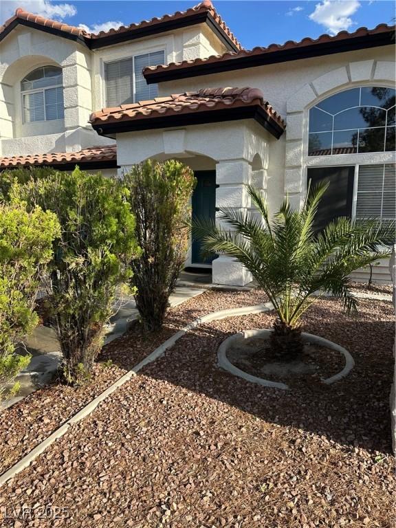 1511 Balsam Mist Ave, Las Vegas, NV 89183 - mediterranean / spanish-style house with a tiled roof and stucco siding