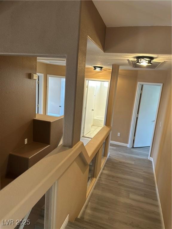 1511 Balsam Mist Ave, Las Vegas, NV 89183 - corridor featuring wood finished floors and baseboards
