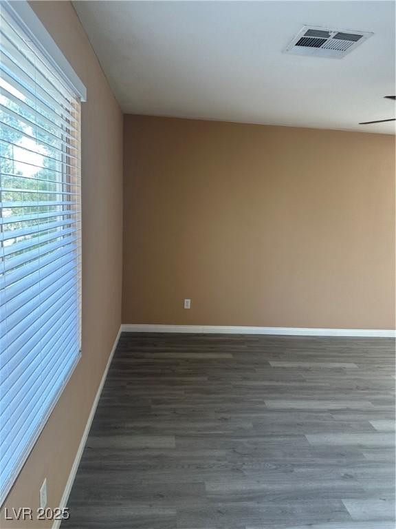 1511 Balsam Mist Ave, Las Vegas, NV 89183 - spare room featuring wood finished floors and baseboards