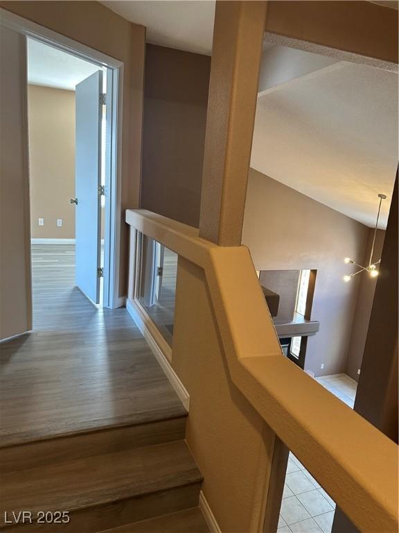 1511 Balsam Mist Ave, Las Vegas, NV 89183 - stairway featuring baseboards and wood finished floors