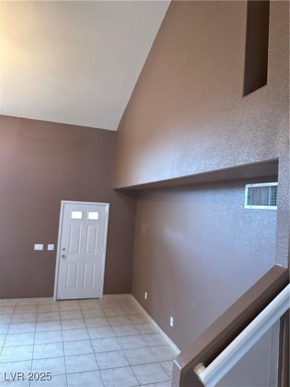 1511 Balsam Mist Ave, Las Vegas, NV 89183 - foyer entrance with high vaulted ceiling and light tile patterned flooring