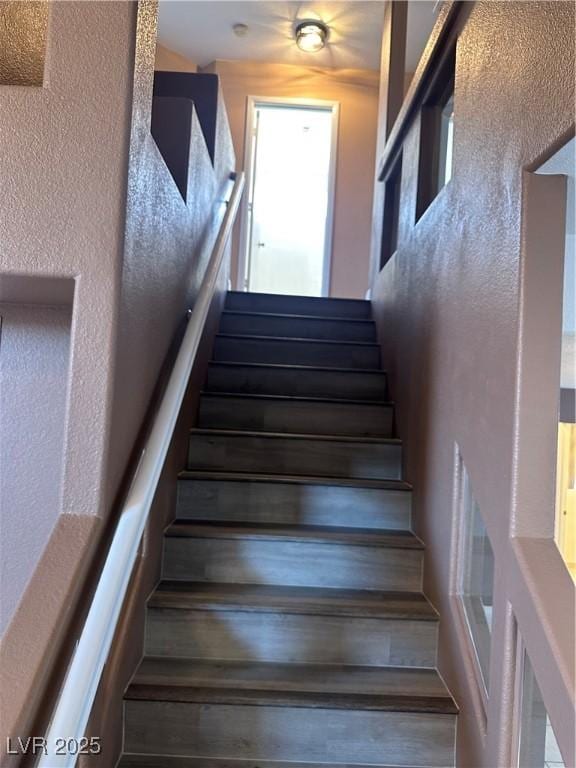 1511 Balsam Mist Ave, Las Vegas, NV 89183 - staircase featuring a textured wall