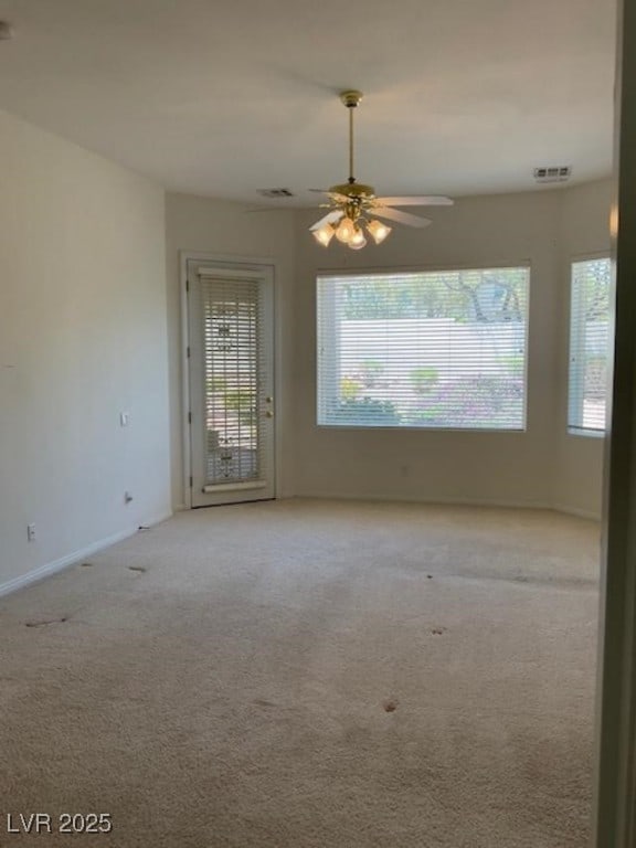 10816 Elm Ridge Ave, Las Vegas, NV 89144 - carpeted spare room with a ceiling fan and baseboards