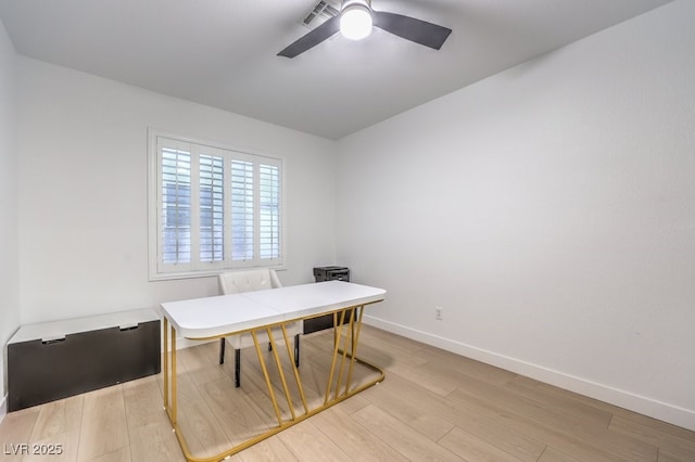722 Descartes Ave, Henderson, NV 89002 - home office with light wood-style flooring, baseboards, and ceiling fan