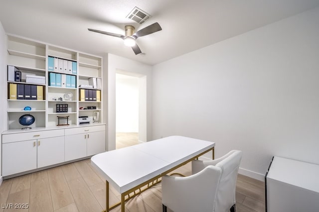 722 Descartes Ave, Henderson, NV 89002 - dining space with a ceiling fan, light wood-type flooring, and baseboards