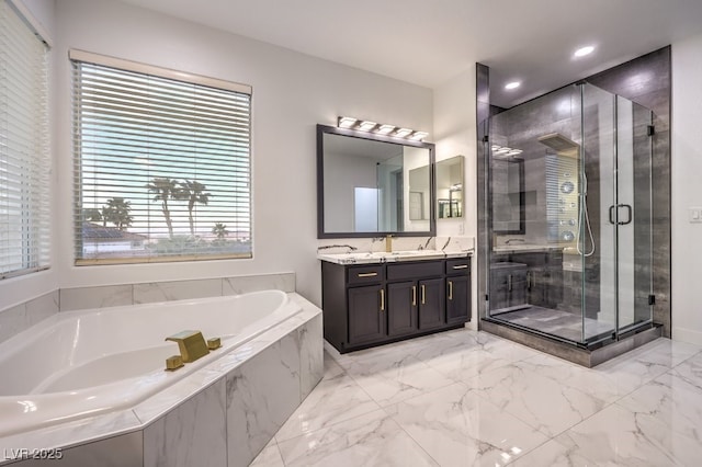 722 Descartes Ave, Henderson, NV 89002 - bathroom with vanity, a garden tub, a shower stall, marble finish floors, and recessed lighting