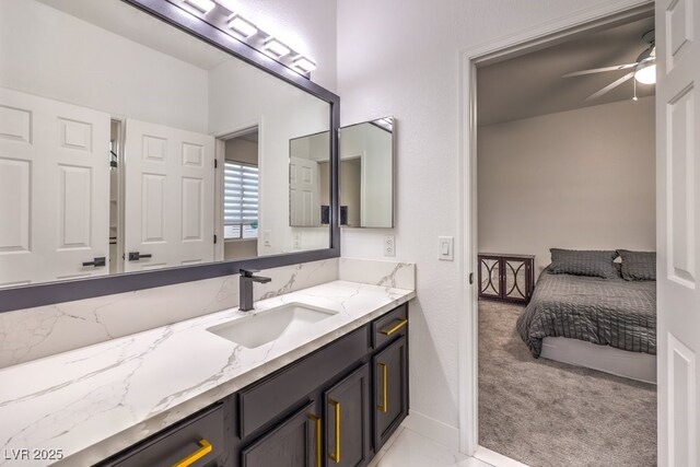 722 Descartes Ave, Henderson, NV 89002 - ensuite bathroom featuring vanity, a ceiling fan, and baseboards
