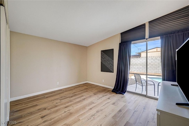 2496 Golfers St, Las Vegas, NV 89142 - empty room with light wood finished floors and baseboards