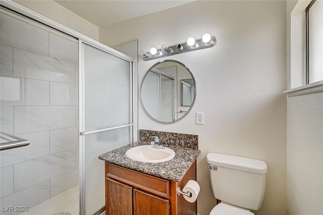 2496 Golfers St, Las Vegas, NV 89142 - bathroom with a stall shower, toilet, and vanity