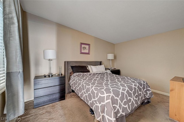2496 Golfers St, Las Vegas, NV 89142 - bedroom with carpet flooring, baseboards, and vaulted ceiling