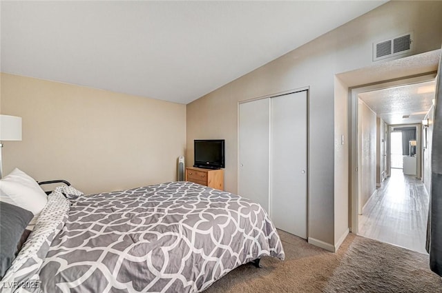 2496 Golfers St, Las Vegas, NV 89142 - bedroom featuring a closet and carpet flooring