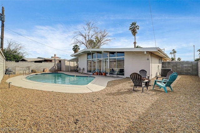 2496 Golfers St, Las Vegas, NV 89142 - view of pool featuring a fenced backyard, central AC, and a patio area