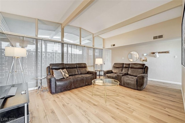 2496 Golfers St, Las Vegas, NV 89142 - living room featuring wood finished floors, baseboards, and beamed ceiling