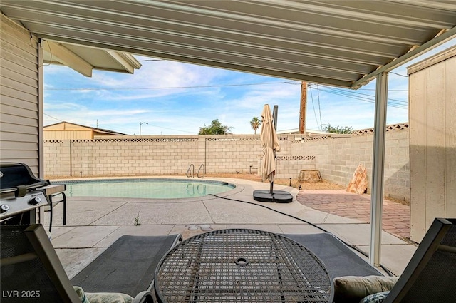 2496 Golfers St, Las Vegas, NV 89142 - view of pool featuring a patio area and a fenced backyard