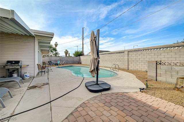 2496 Golfers St, Las Vegas, NV 89142 - view of swimming pool with a patio area, a fenced backyard, and grilling area