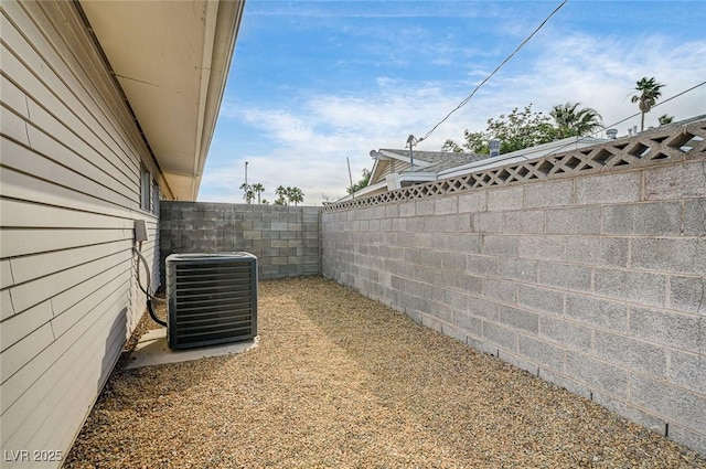 2496 Golfers St, Las Vegas, NV 89142 - fenced backyard featuring central AC