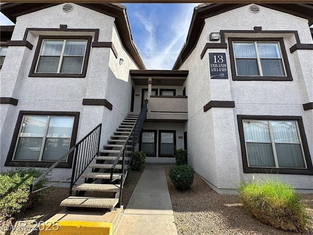 45 Maleena Mesa St Unit 1321, Henderson, NV 89074 - doorway to property with stucco siding