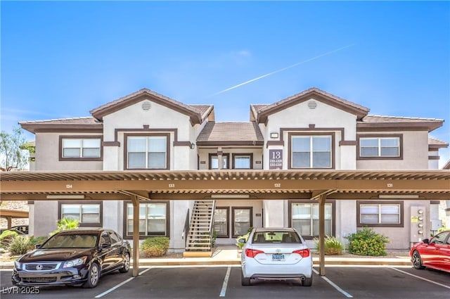 45 Maleena Mesa St Unit 1321, Henderson, NV 89074 - view of front of house with stucco siding and covered parking