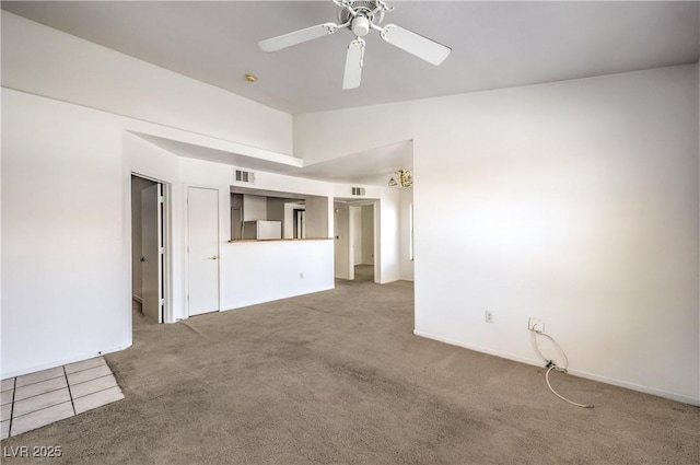 45 Maleena Mesa St Unit 1321, Henderson, NV 89074 - unfurnished living room with carpet flooring, a ceiling fan, and vaulted ceiling