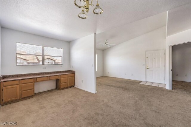 45 Maleena Mesa St Unit 1321, Henderson, NV 89074 - unfurnished office with light carpet, ceiling fan, built in desk, a chandelier, and lofted ceiling