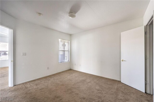 45 Maleena Mesa St Unit 1321, Henderson, NV 89074 - unfurnished bedroom featuring carpet