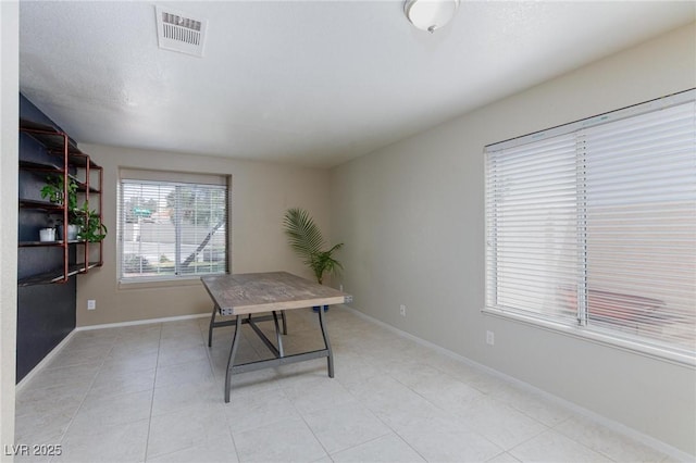 9817 Dardanelle Ct, Las Vegas, NV 89117 - home office with baseboards and light tile patterned floors