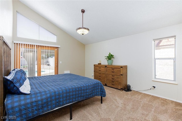 9817 Dardanelle Ct, Las Vegas, NV 89117 - carpeted bedroom with multiple windows, access to exterior, and vaulted ceiling