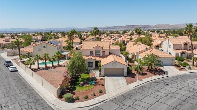 9817 Dardanelle Ct, Las Vegas, NV 89117 - aerial perspective of suburban area with a mountainous background and a pool area