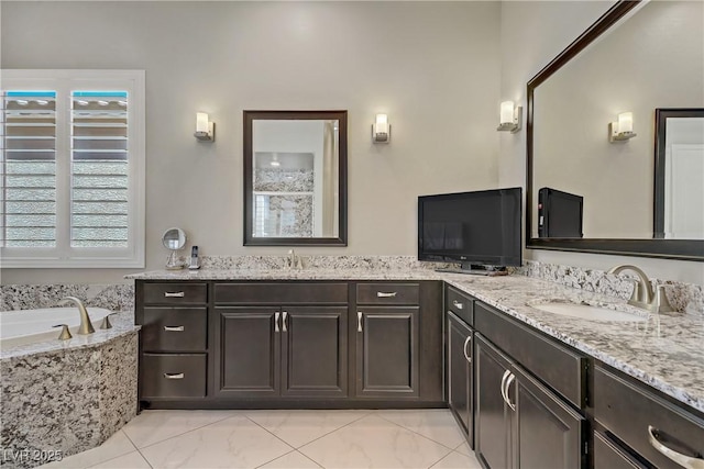 3155 Dalmazia Ave, Henderson, NV 89044 - full bathroom featuring double vanity, a garden tub, and plenty of natural light