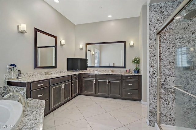 3155 Dalmazia Ave, Henderson, NV 89044 - bathroom featuring double vanity, a shower stall, tile patterned flooring, a tub to relax in, and recessed lighting