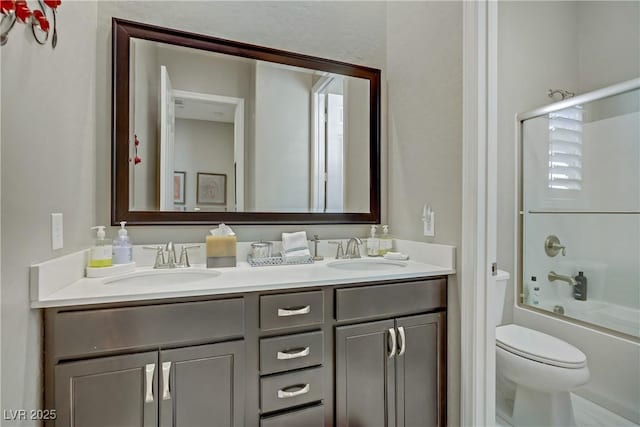 3155 Dalmazia Ave, Henderson, NV 89044 - full bathroom featuring double vanity, toilet, and bathing tub / shower combination