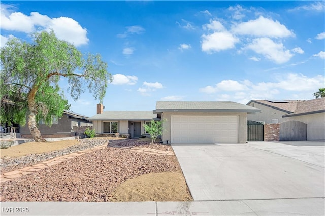 6791 Greengrove Dr, Las Vegas, NV 89103 - single story home featuring a gate, driveway, a garage, stucco siding, and a chimney