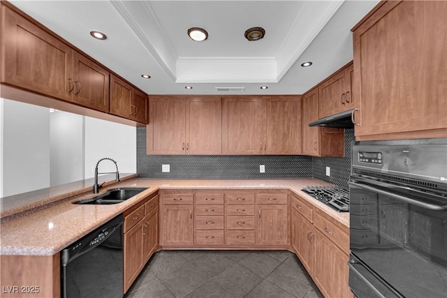 6791 Greengrove Dr, Las Vegas, NV 89103 - kitchen featuring a sink, black appliances, a tray ceiling, under cabinet range hood, and recessed lighting