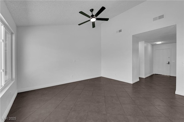 6791 Greengrove Dr, Las Vegas, NV 89103 - unfurnished room featuring a textured ceiling, a ceiling fan, dark tile patterned flooring, and baseboards