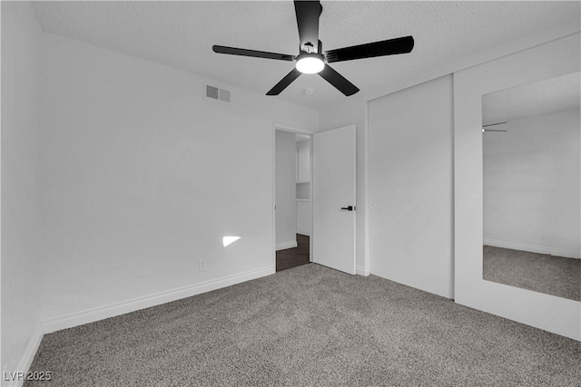 6791 Greengrove Dr, Las Vegas, NV 89103 - unfurnished bedroom featuring carpet floors, a closet, a ceiling fan, and a textured ceiling