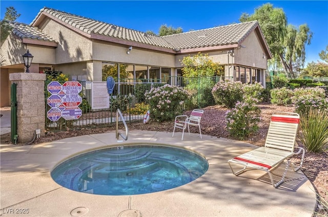5710 E Tropicana Ave Unit 1114, Las Vegas, NV 89122 - view of pool featuring a hot tub and a patio area