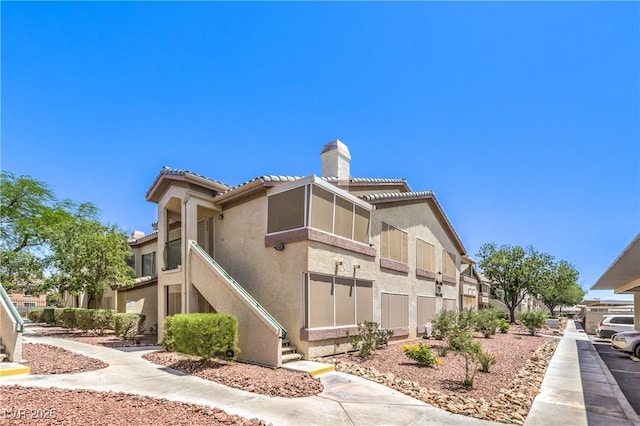 5710 E Tropicana Ave Unit 1114, Las Vegas, NV 89122 - view of property featuring stairway