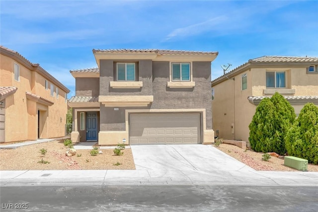 9766 Marcelline Ave, Las Vegas, NV 89148 - view of front of home featuring an attached garage, stucco siding, concrete driveway, and a tiled roof