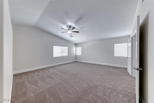 9766 Marcelline Ave, Las Vegas, NV 89148 - carpeted empty room featuring a ceiling fan, vaulted ceiling, and baseboards