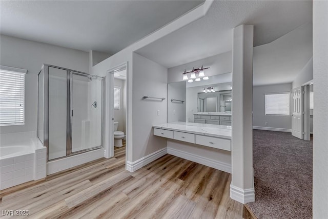 9766 Marcelline Ave, Las Vegas, NV 89148 - full bath featuring toilet, a shower stall, vanity, a bath, and baseboards