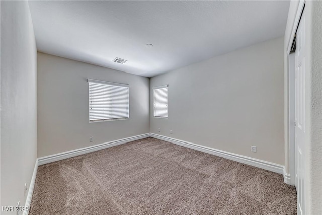 9766 Marcelline Ave, Las Vegas, NV 89148 - carpeted empty room with baseboards