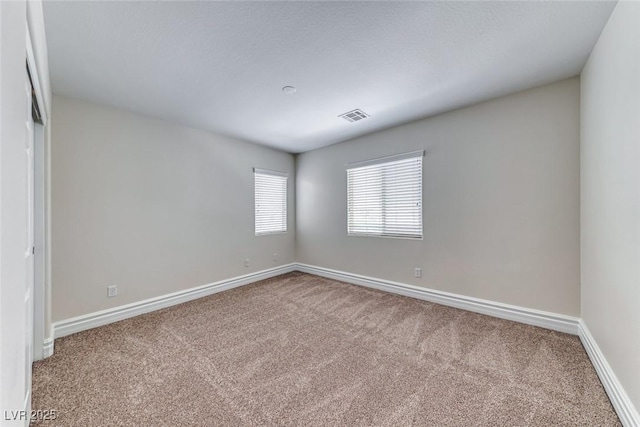 9766 Marcelline Ave, Las Vegas, NV 89148 - carpeted spare room featuring baseboards