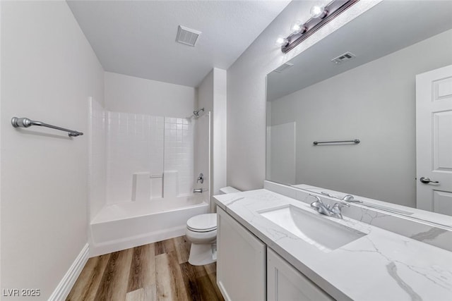 9766 Marcelline Ave, Las Vegas, NV 89148 - full bathroom with toilet, vanity, wood finished floors, shower / tub combination, and baseboards