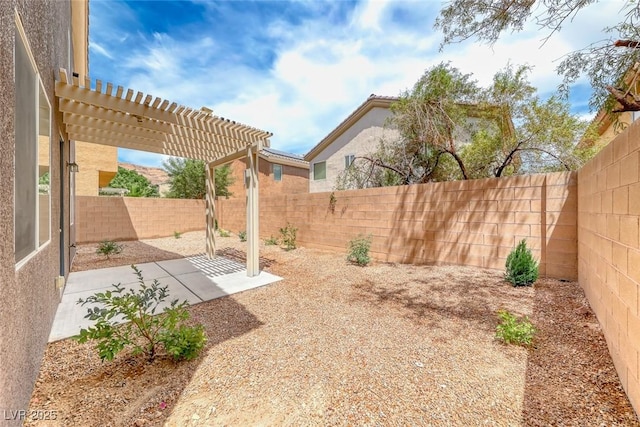 9766 Marcelline Ave, Las Vegas, NV 89148 - fenced backyard featuring a patio and a pergola