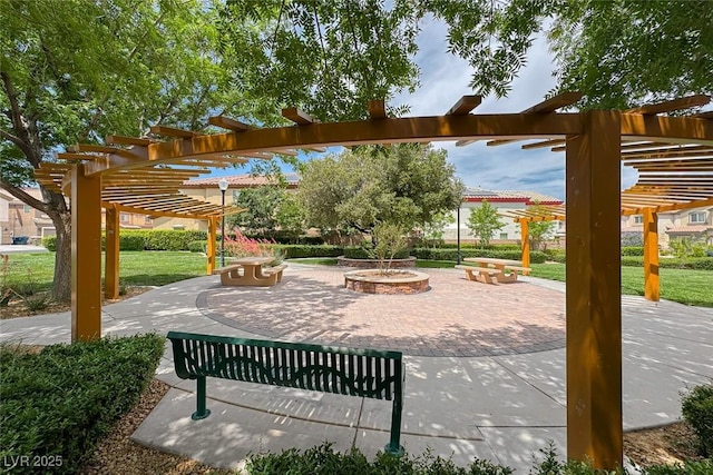 9766 Marcelline Ave, Las Vegas, NV 89148 - view of community with a pergola, an outdoor fire pit, and a patio area